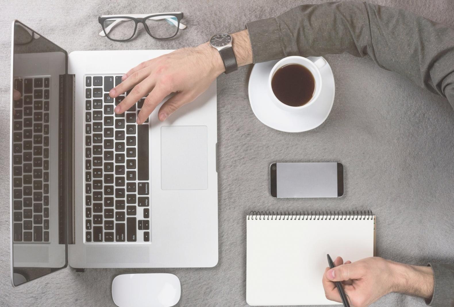 Students working on financial planning exercises in classroom setting